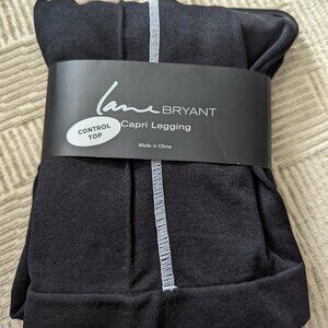 1X Lane Bryant black white stripe on sides.